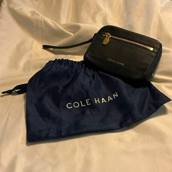 Cole Haan Handbags - NWT Cole Haan Black Leather Wristlet with Navy Dust Bag